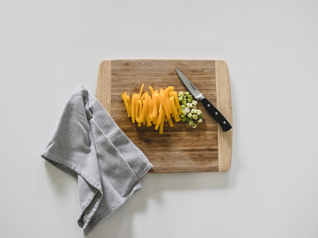 Colorful Buddha bowl with grains, vegetables, legumes and tahini drizzle